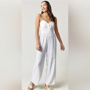 francesca's Trista Pom Front Tie Jumpsuit